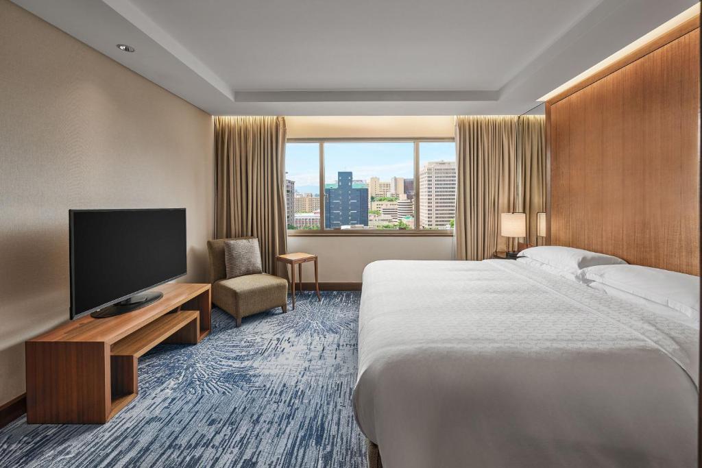 TV a/nebo společenská místnost v ubytování Sheraton Grand Taipei Hotel