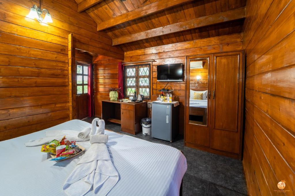 Televiisor ja/või meelelahutuskeskus majutusasutuses TT Beach Cottages
