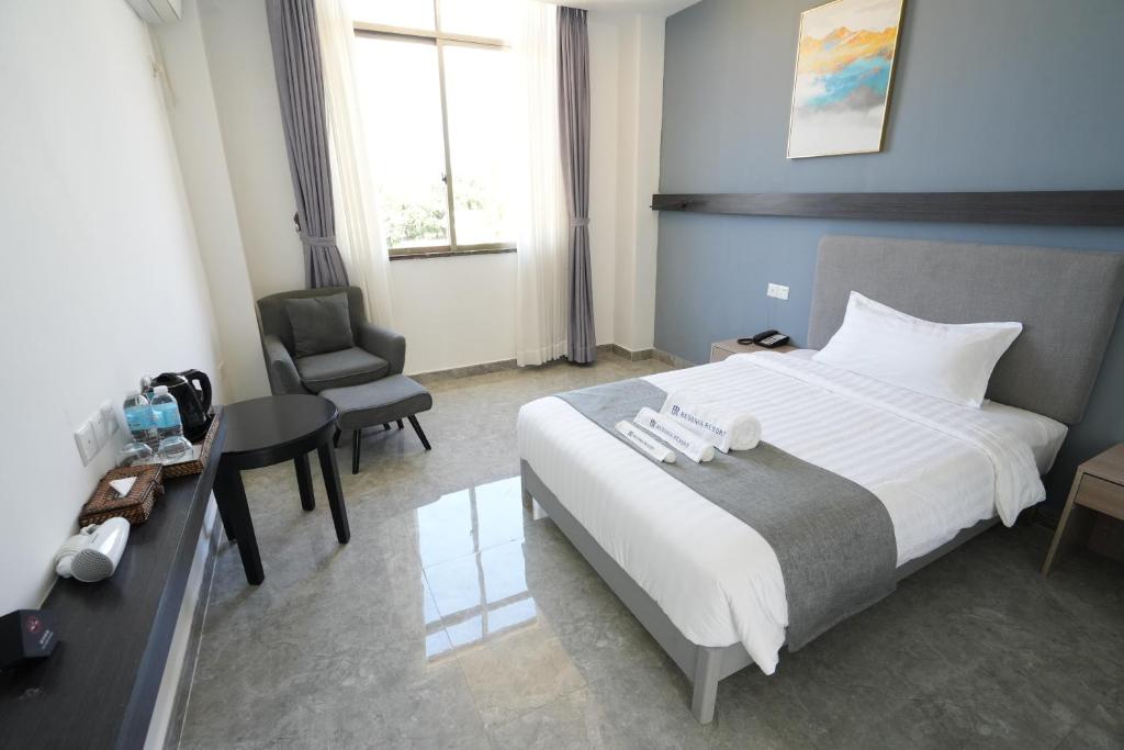 Postel nebo postele na pokoji v ubytování Bohol Panglao Begonia Resort
