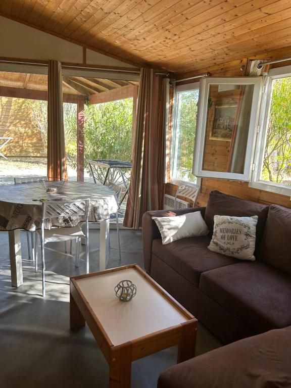 Posezení v ubytování Le chalet fleuri aux 4 saisons