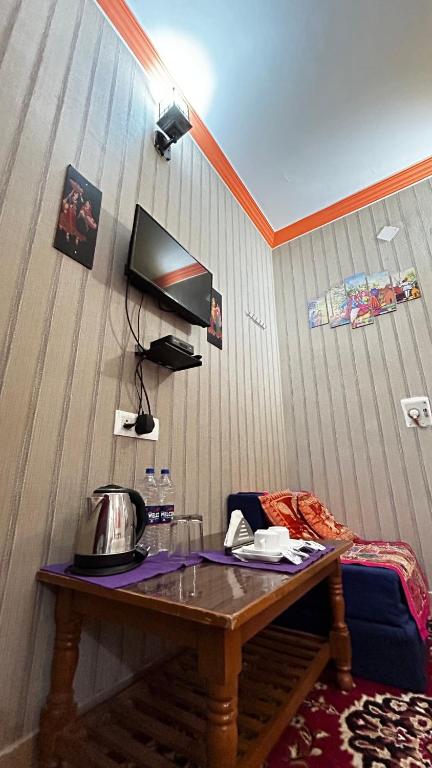 TV a/nebo společenská místnost v ubytování The Hotel Rose Fort