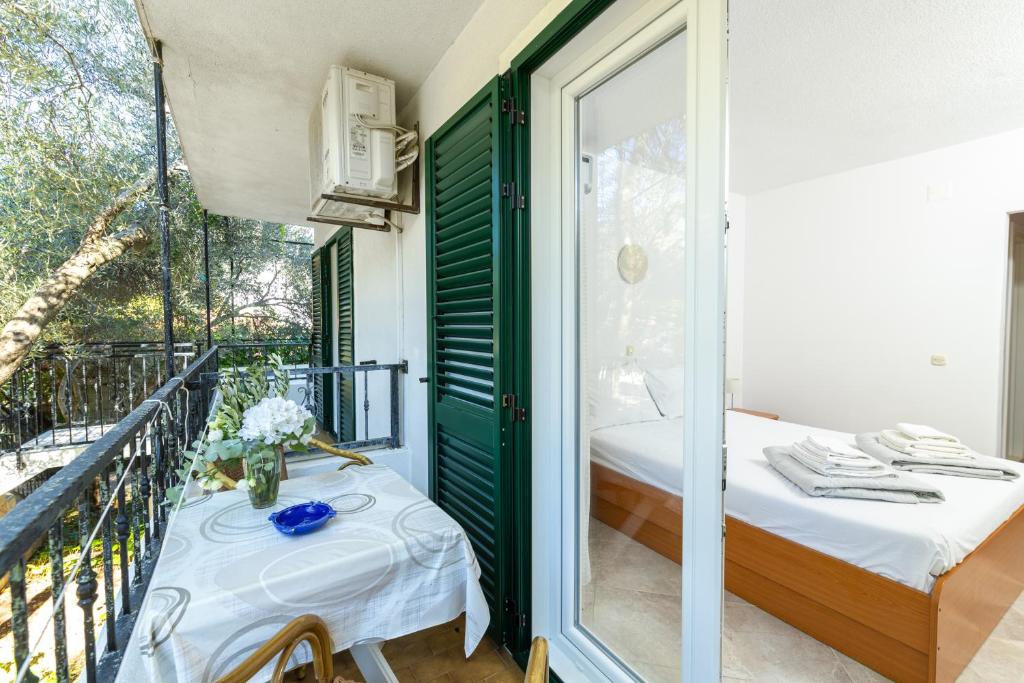 Posteľ alebo postele v izbe v ubytovaní Apartmani Ružica