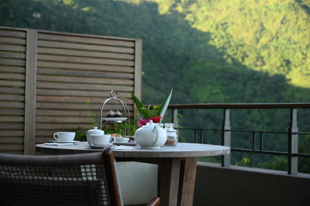Balkón nebo terasa v ubytování Taj Chia Kutir Resort & Spa Darjeeling