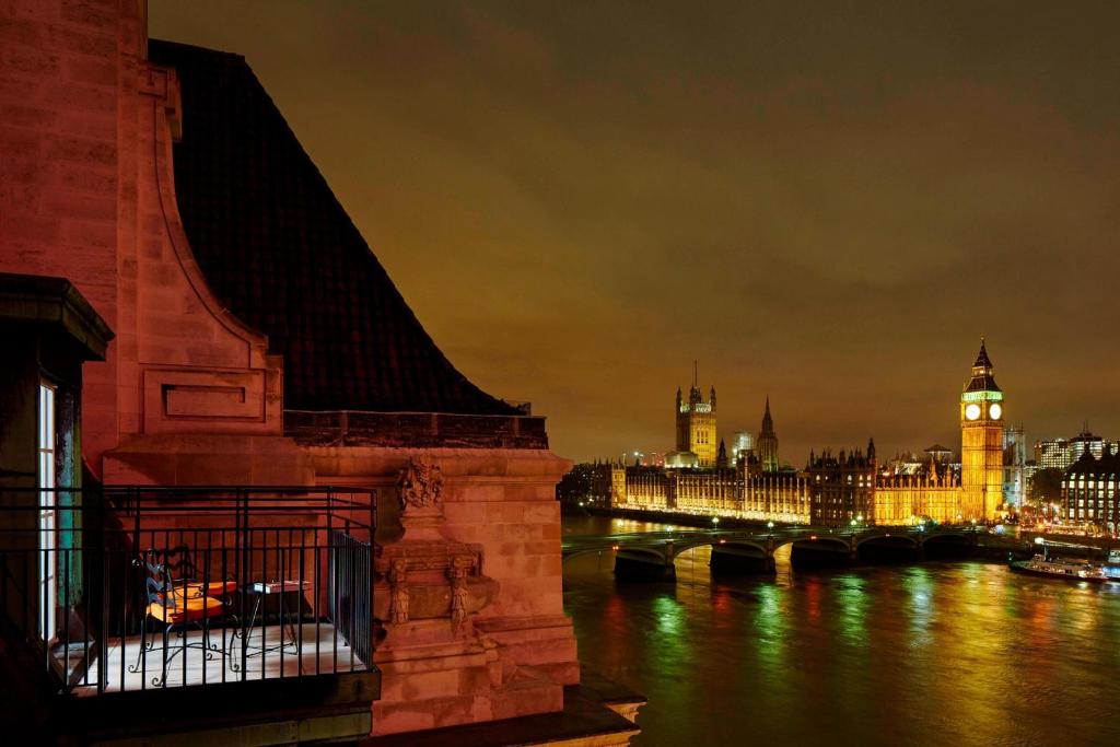 a view of the city of london and the river thames at night at London Marriott Hotel County Hall in London