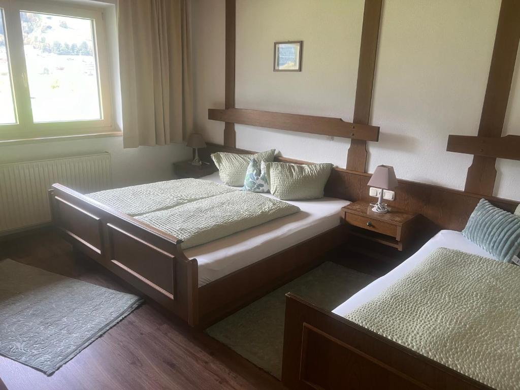 Postel nebo postele na pokoji v ubytování Apart Bergblick
