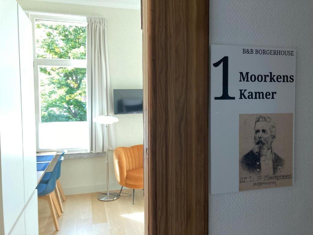 Televiisor ja/või meelelahutuskeskus majutusasutuses Borgerhouse B&B