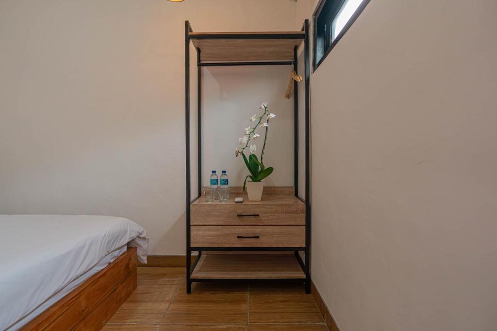 Postel nebo postele na pokoji v ubytování Elbe Homestay By Bali Cabin