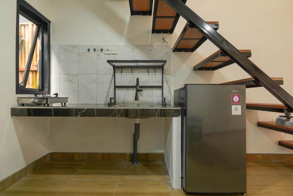 Kuchyň nebo kuchyňský kout v ubytování Elbe Homestay By Bali Cabin