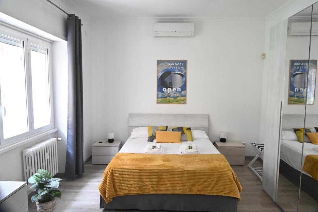 A bed or beds in a room at Appia Antica Guest House