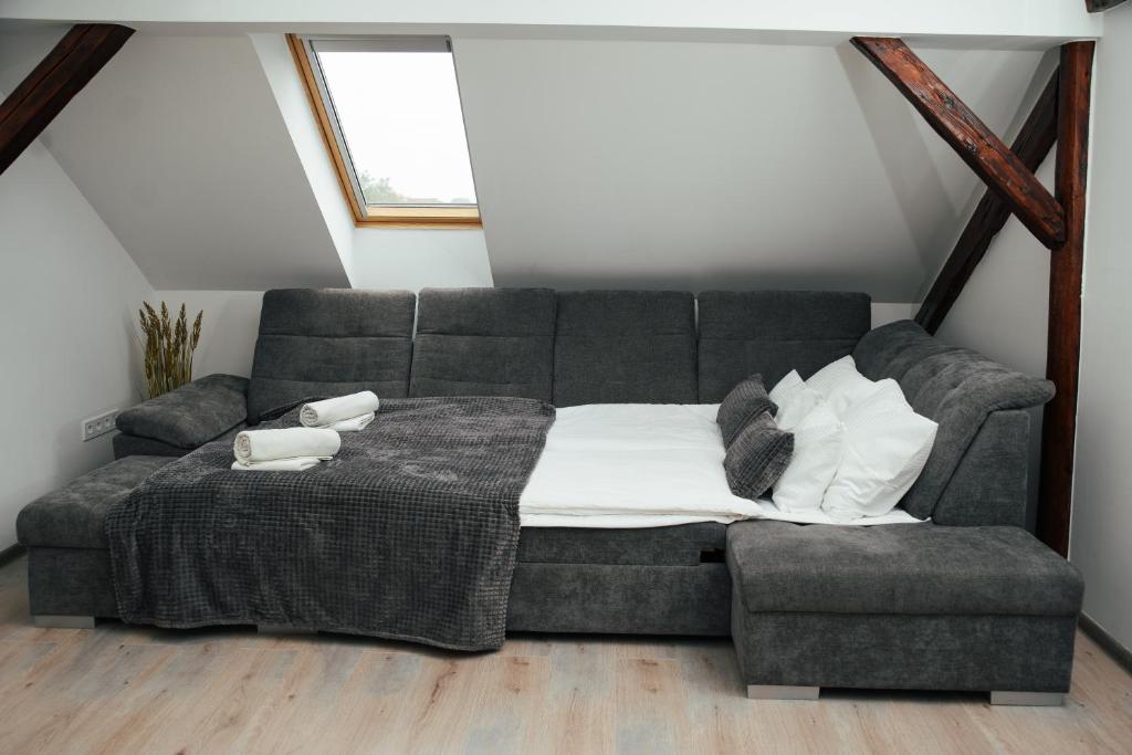 Posezení v ubytování H30 Apartman