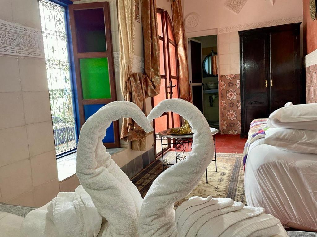 Postel nebo postele na pokoji v ubytování Héritage Lalla Aicha Hotel & Spa