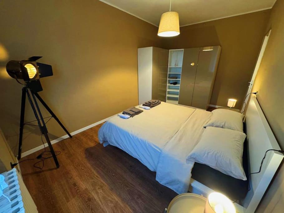 Postel nebo postele na pokoji v ubytování Vittorio Home