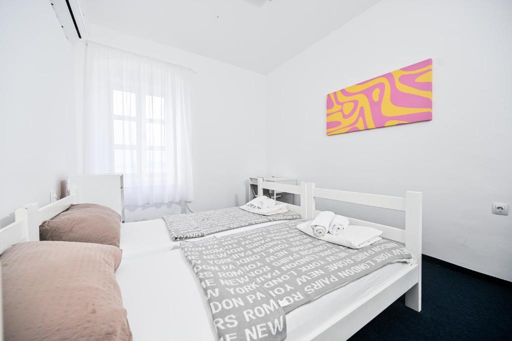 Postel nebo postele na pokoji v ubytování Hostel Fun