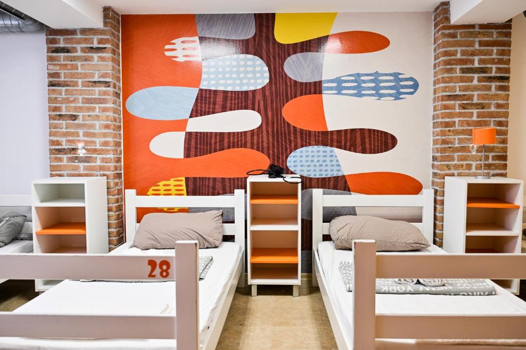Postel nebo postele na pokoji v ubytování Hostel Fun