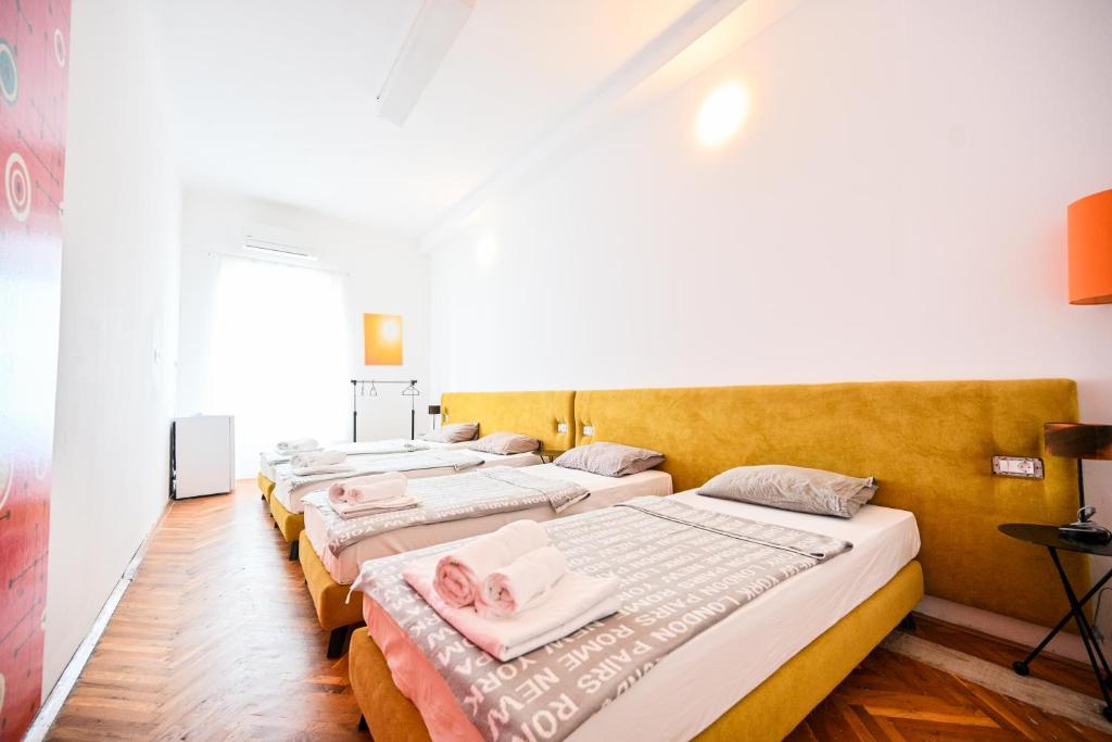 Postel nebo postele na pokoji v ubytování Hostel Fun