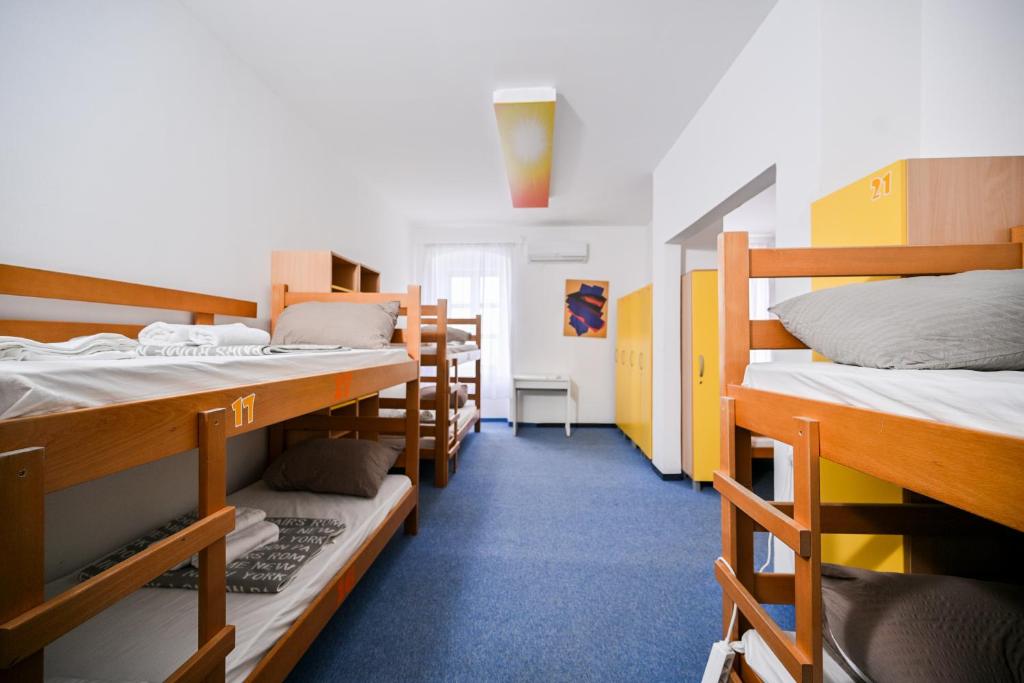 Postel nebo postele na pokoji v ubytování Hostel Fun