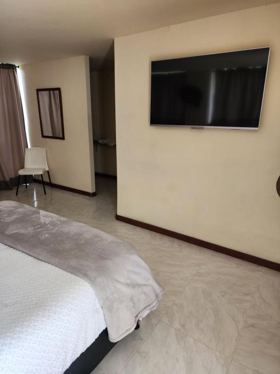 TV a/nebo společenská místnost v ubytování Eco hotel Torino