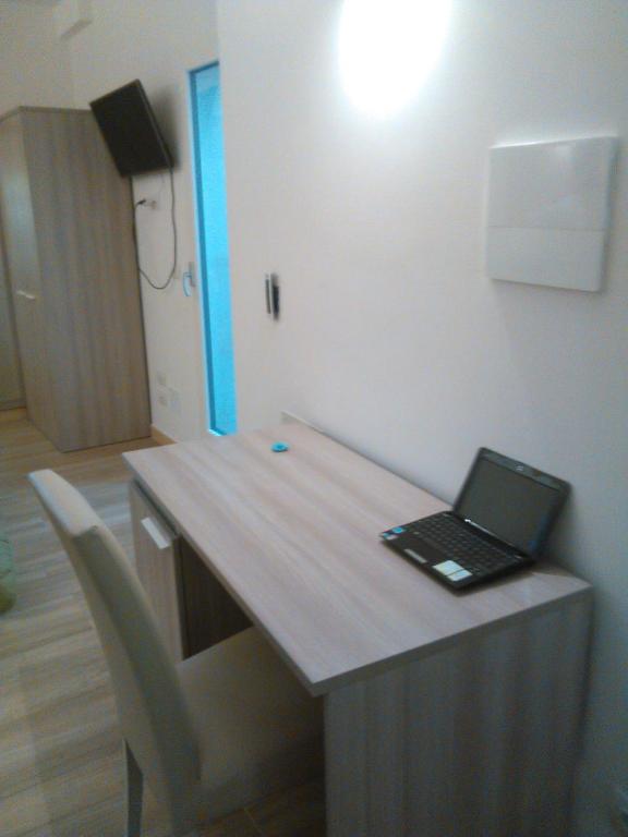 Telewizja i/lub zestaw kina domowego w obiekcie B&B Il Campanile