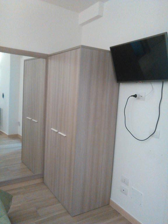 Telewizja i/lub zestaw kina domowego w obiekcie B&B Il Campanile