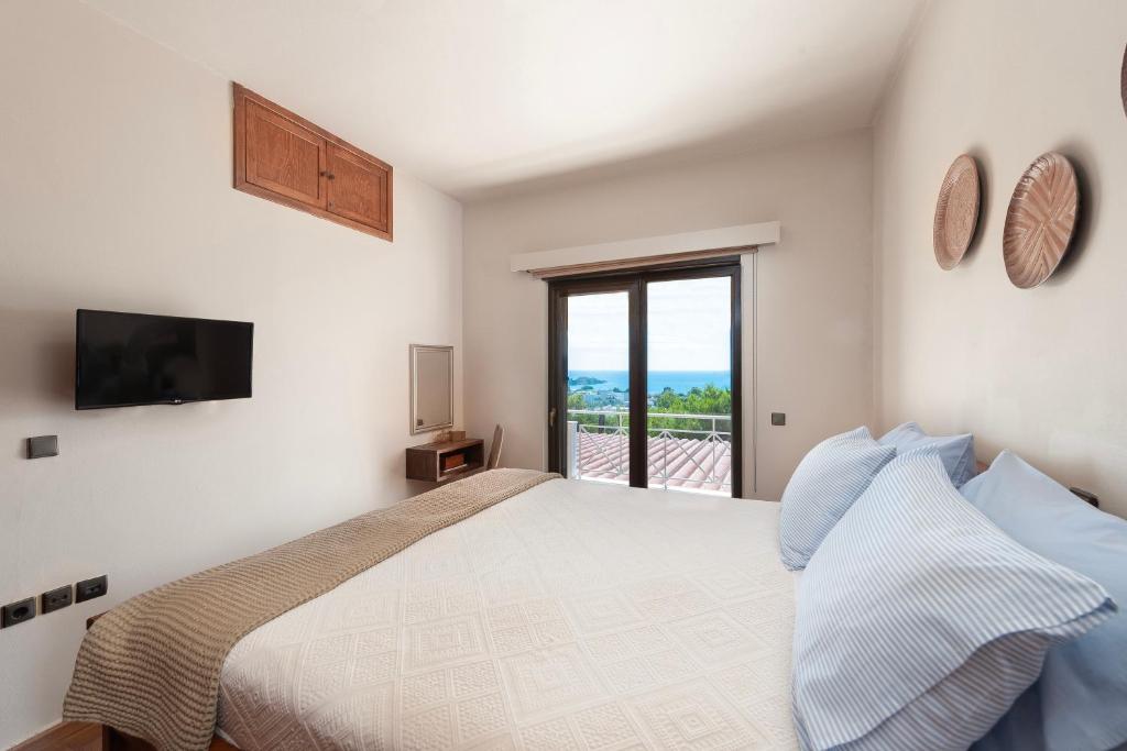 Posteľ alebo postele v izbe v ubytovaní Blue Vision Luxury House
