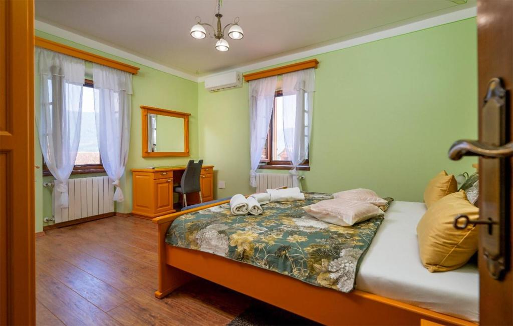Postel nebo postele na pokoji v ubytování Villa Milena