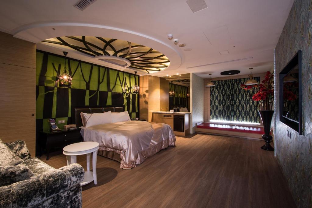 Katil atau katil-katil dalam bilik di U-Her Hotel