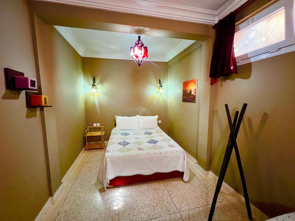 Postel nebo postele na pokoji v ubytování DreamCatcher Homes