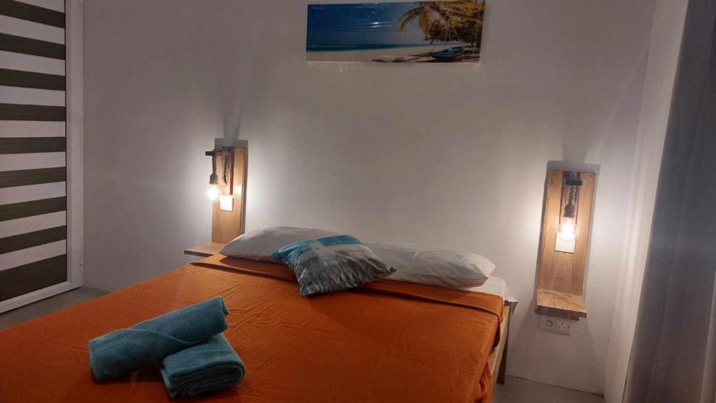 Postel nebo postele na pokoji v ubytování IZAVA LODGE