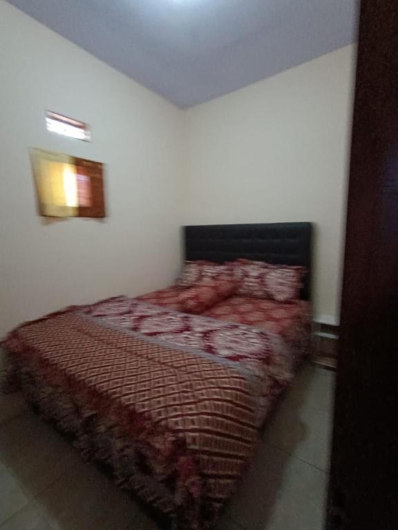 Postel nebo postele na pokoji v ubytování Oryza villa