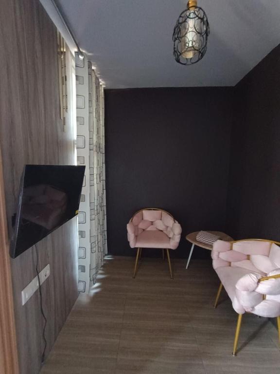 TV a/nebo společenská místnost v ubytování Oryza villa