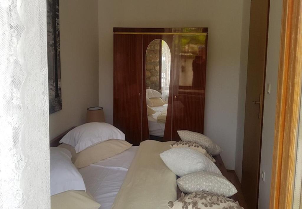Posteľ alebo postele v izbe v ubytovaní Apartments and Room Perstel