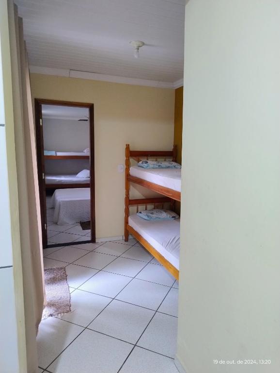 Postel nebo postele na pokoji v ubytování Pousada Cantinho D´Lilica
