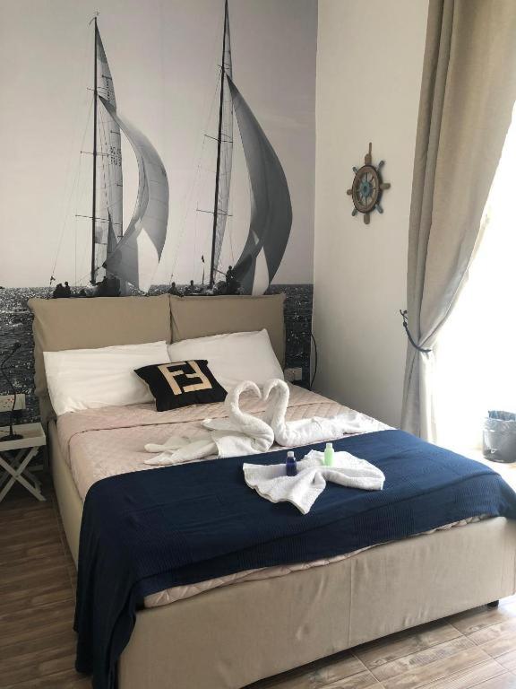 Postel nebo postele na pokoji v ubytování Nautilus