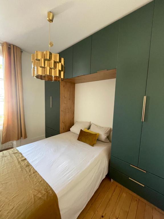 Postel nebo postele na pokoji v ubytování Demeure de charme
