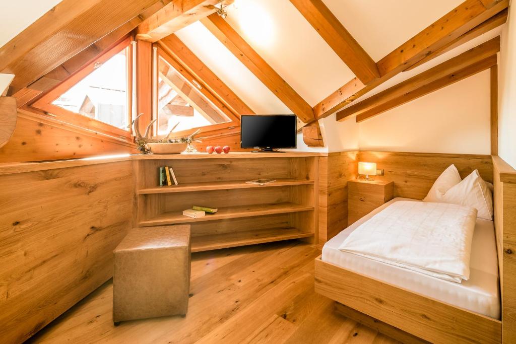 Łóżko lub łóżka w pokoju w obiekcie DolceVita Hotel Jagdhof