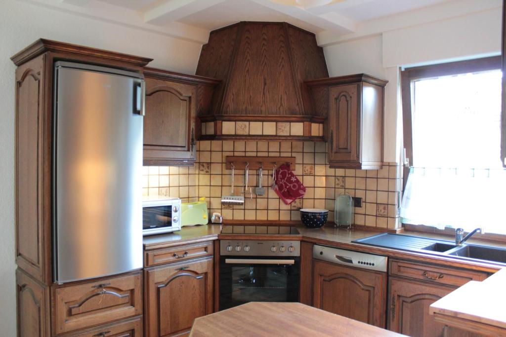 Kuchyň nebo kuchyňský kout v ubytování Ferienhaus Dell
