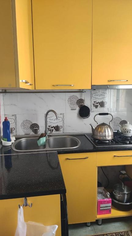Кухня або міні-кухня у Apartment