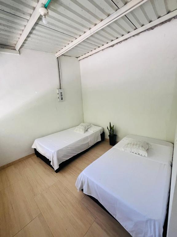 Postel nebo postele na pokoji v ubytování Hostel no glam boutique
