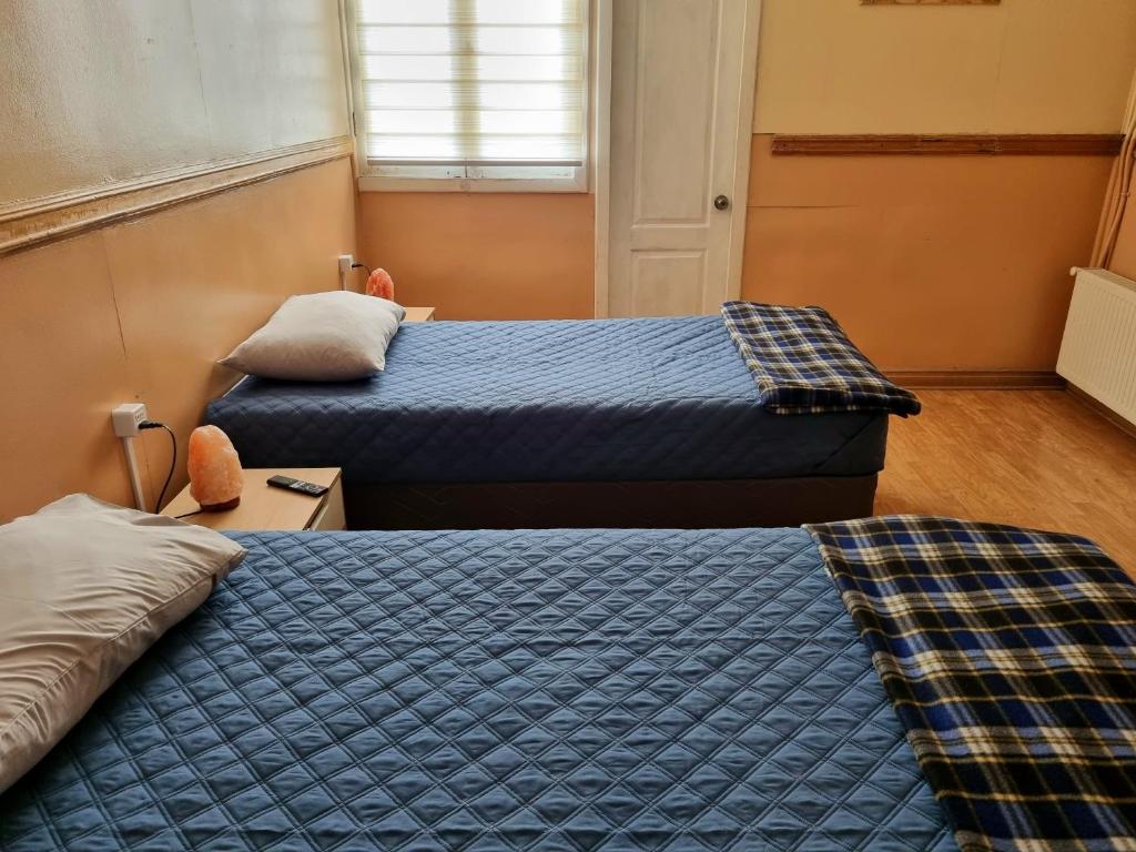 Postel nebo postele na pokoji v ubytování Gauchito Patagón