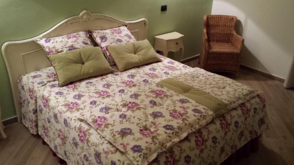 Postel nebo postele na pokoji v ubytování La Vignola Country Hotel