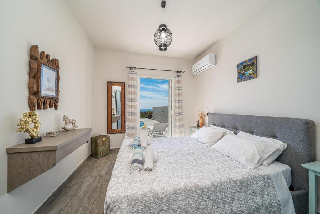 Postel nebo postele na pokoji v ubytování Villa Dandelion