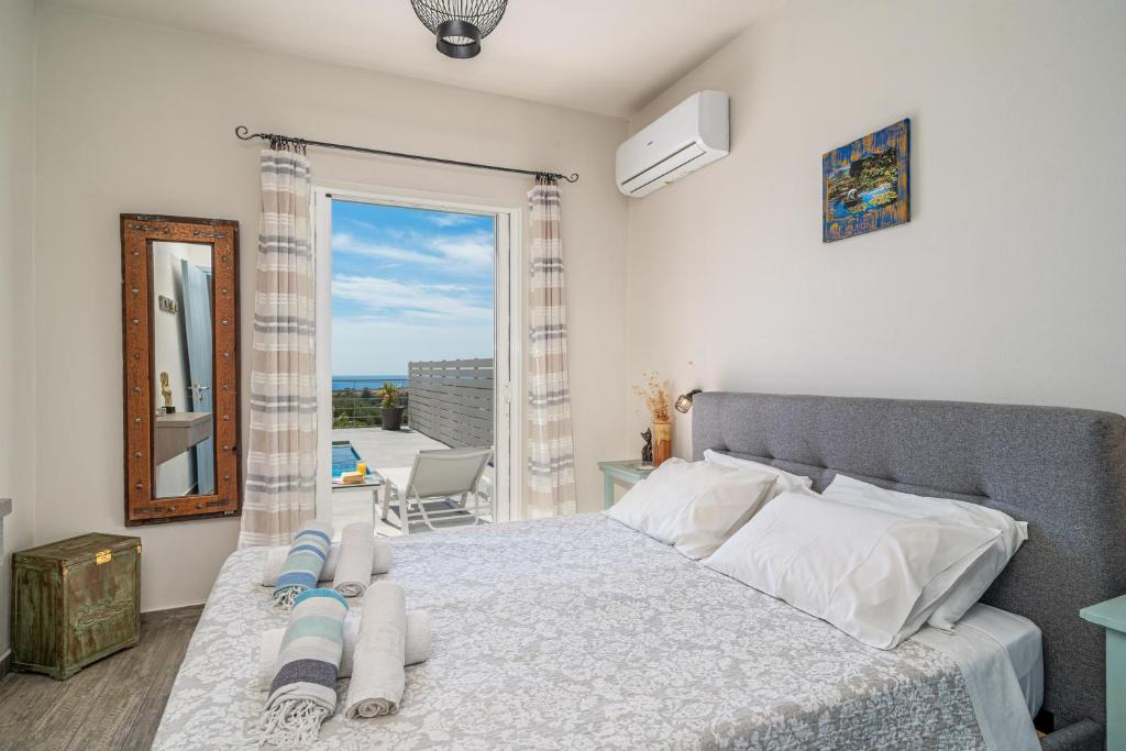 Postel nebo postele na pokoji v ubytování Villa Dandelion
