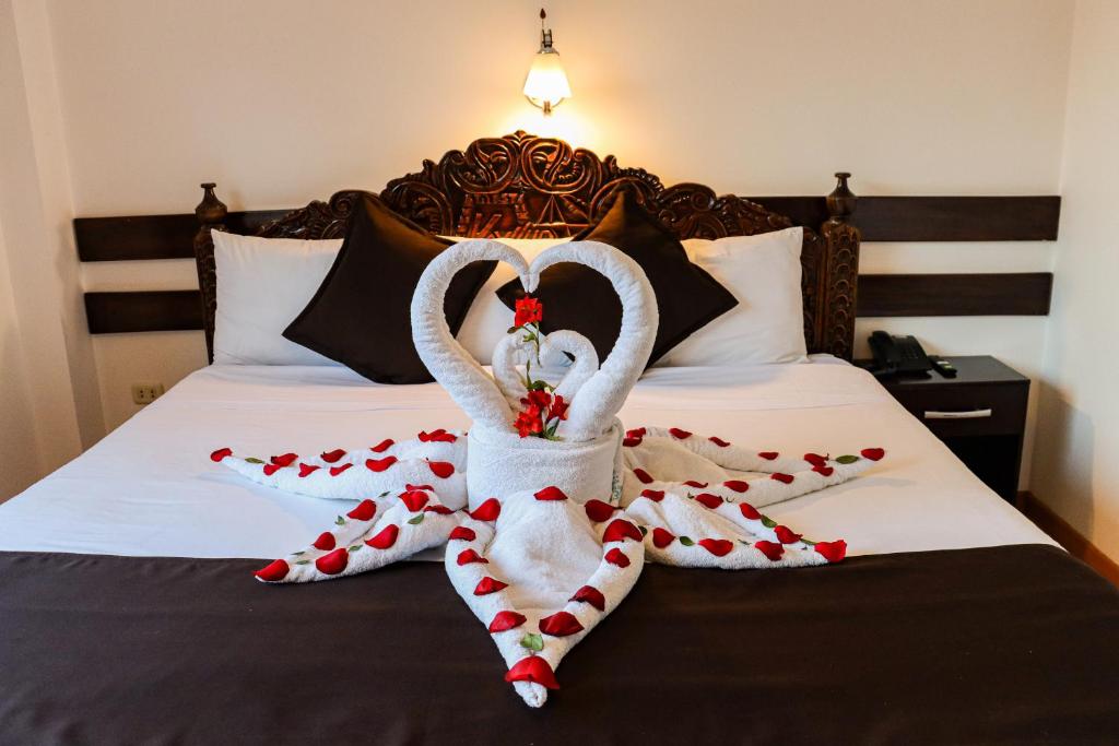 Postel nebo postele na pokoji v ubytování Hotel Kapac Inn-San Blas