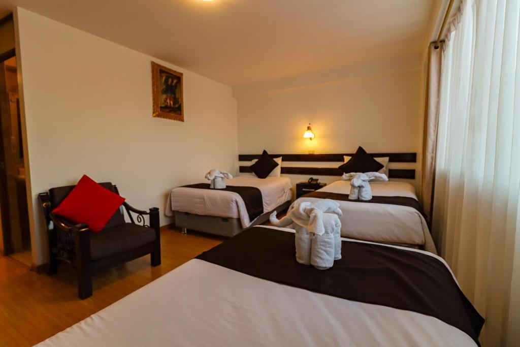 Postel nebo postele na pokoji v ubytování Hotel Kapac Inn-San Blas