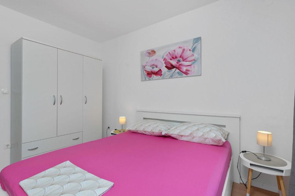 Postel nebo postele na pokoji v ubytování Apartment Uga2