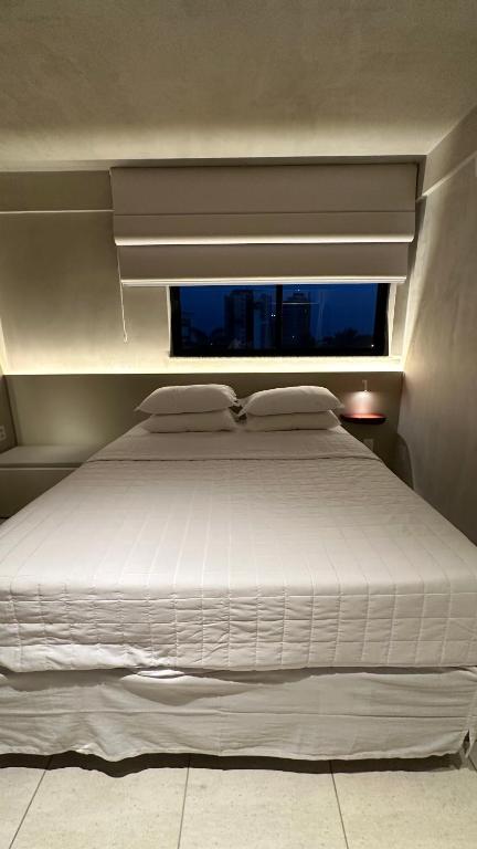 Postel nebo postele na pokoji v ubytování Loft 2 Edf celita Franca Business e flat