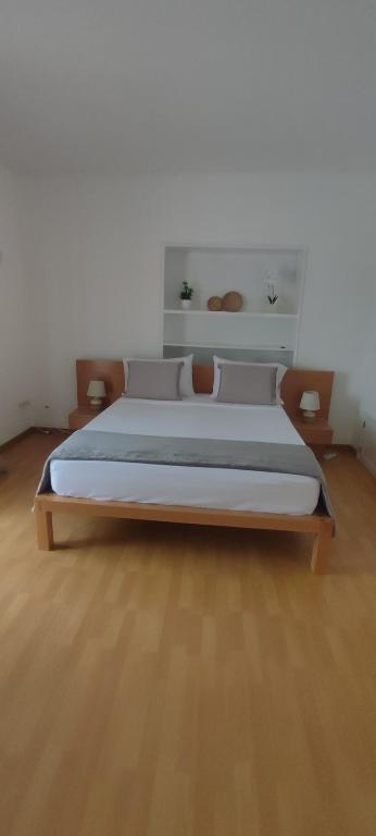 Postel nebo postele na pokoji v ubytování Casa TIANA