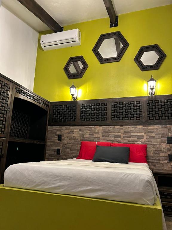 Postel nebo postele na pokoji v ubytování Hotel Villas Camargo