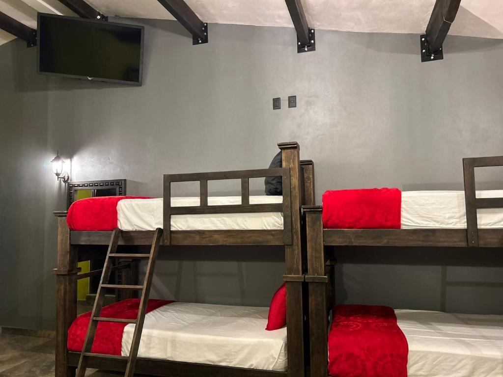 Postel nebo postele na pokoji v ubytování Hotel Villas Camargo