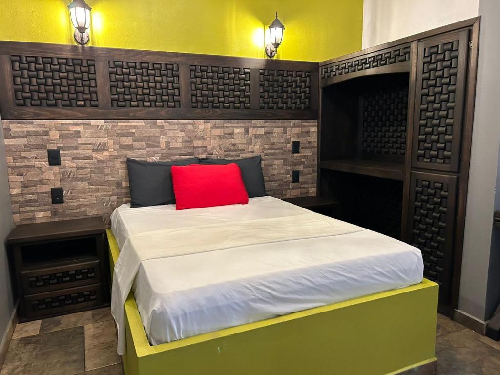 Postel nebo postele na pokoji v ubytování Hotel Villas Camargo